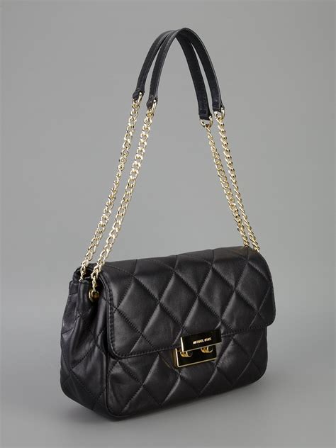 michael kors quilted floral bag black|Michael Kors black studded handbag.